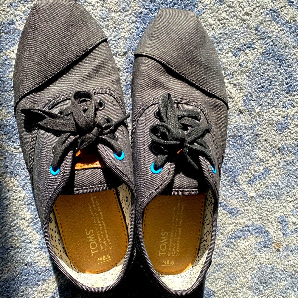 Tom’s charcoal loafers in great condition